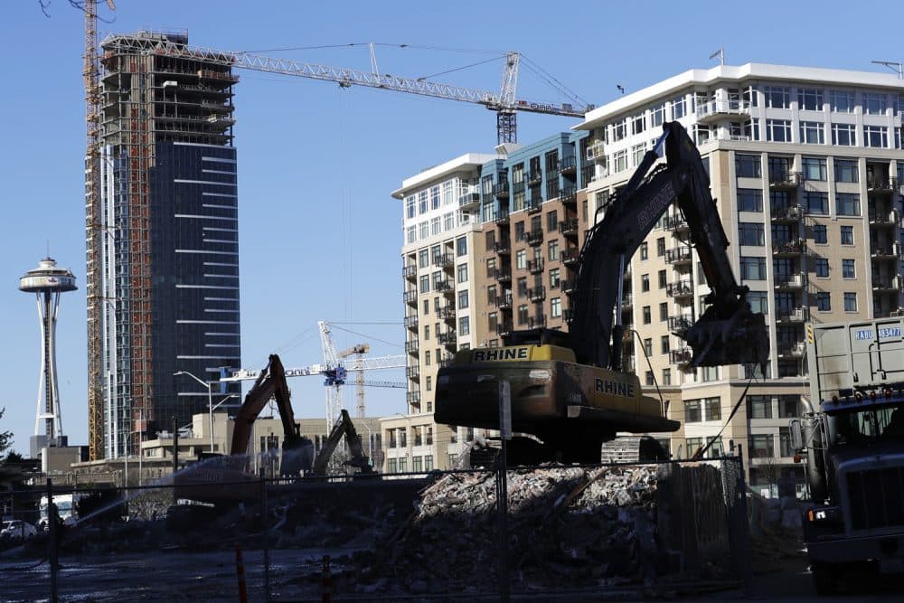 The site of a planned twin-tower 45-story new apartment development in Seattle's Denny Triangle neighborhood, as seen in Feb. 2018, near Amazon.com's headquarters in Seattle. (Ted S. Warren/AP)