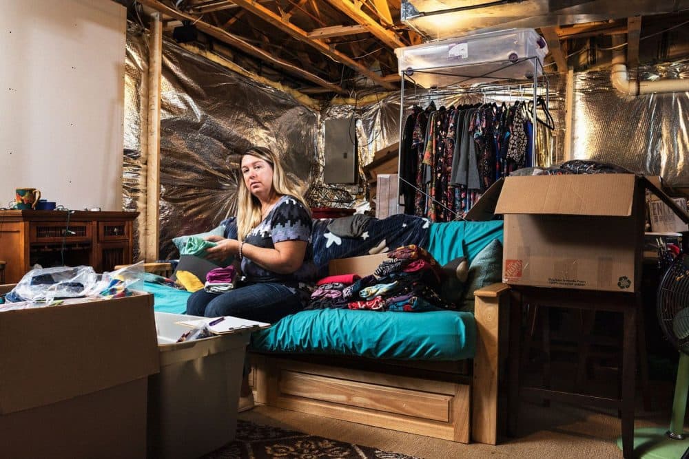 Amy Jo Reece in her basement in Culpepper, Va., with her unsold inventory. (Damon Casarez for Bloomberg Businessweek)