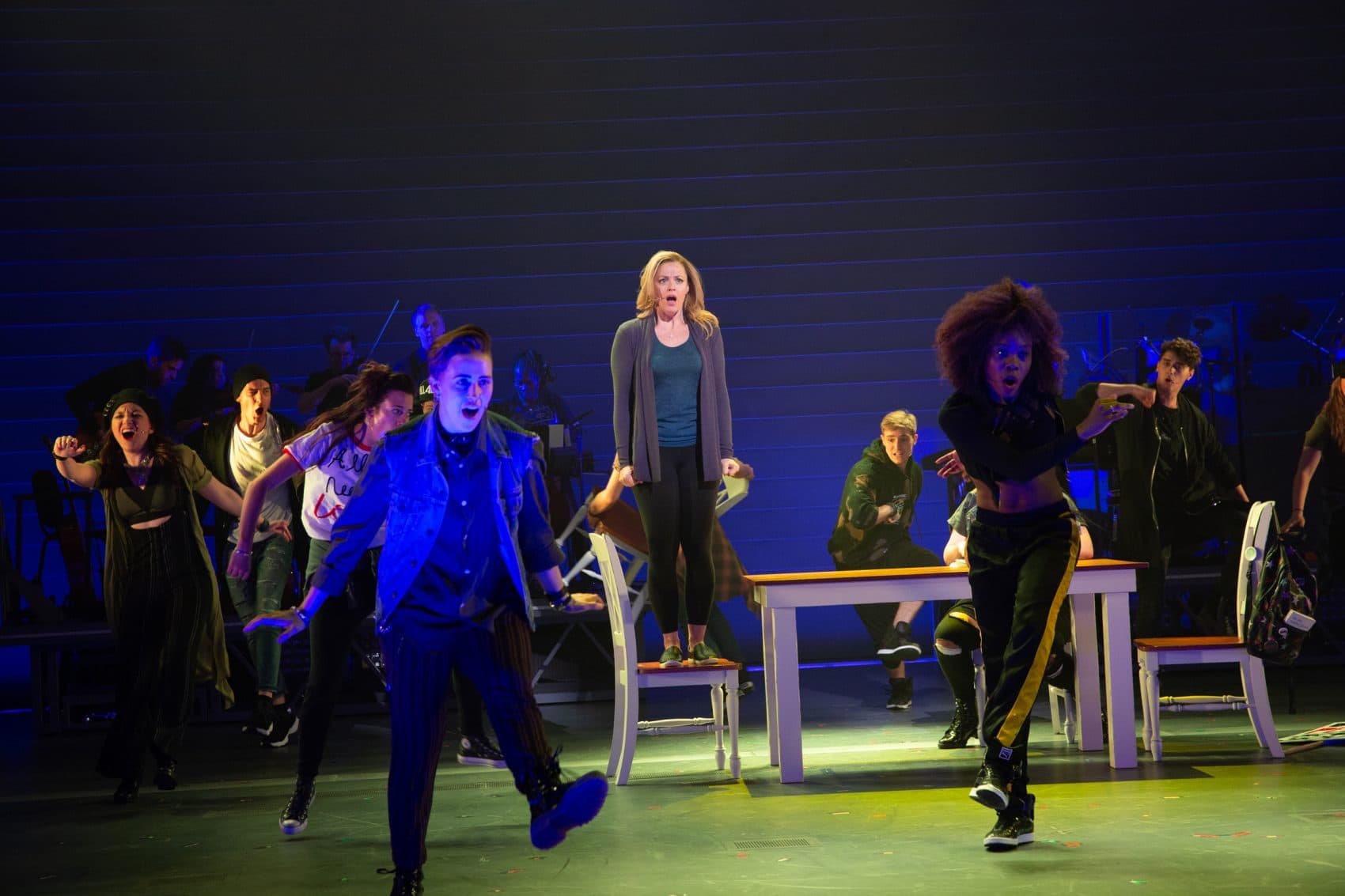 Elizabeth Stanley surrounded by the chorus of "Jagged Little Pill." (Courtesy Evgenia Eliseeva/A.R.T.)