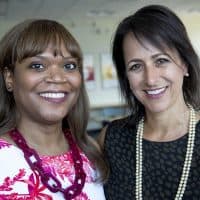 Edie Stringfellow, director of diversity and inclusion at the Massachusetts Biotechnology Council, and Paula Soteropoulos, CEO of Akcea Therapeutics. (Robin Lubbock/WBUR)