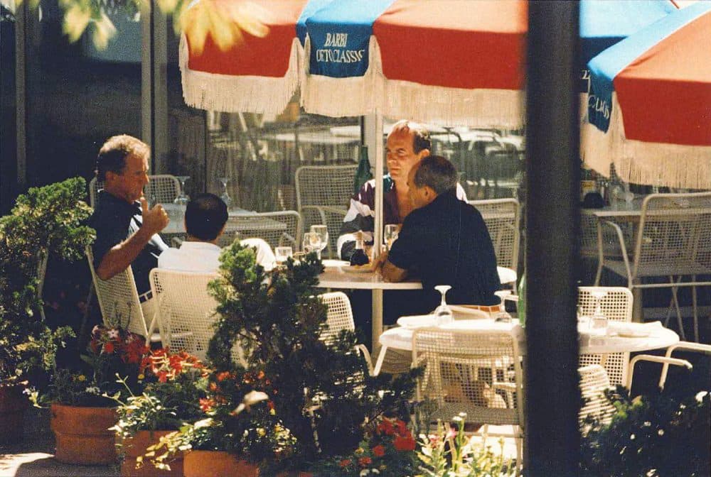 In this 1993 FBI surveillance photo, Francis "Cadillac Frank" Salemme, left, Stephen "The Rifleman" Flemmi, second from left with back to camera, and Frank Salemme Jr., behind right, are seated at The Charles Hotel in Cambridge, Mass. (FBI surveillance photo via AP)