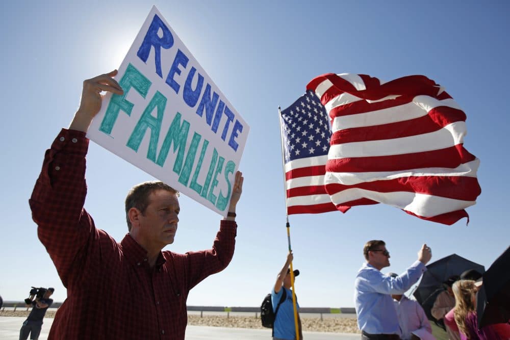 Luther Johnson, of Phoenix, Az., demonstrates as a group of U.S. mayors hold a press conference outside the holding facility for immigrant children in Tornillo, Texas, near the Mexican border, Thursday, June 21, 2018. (Andres Leighton/AP)