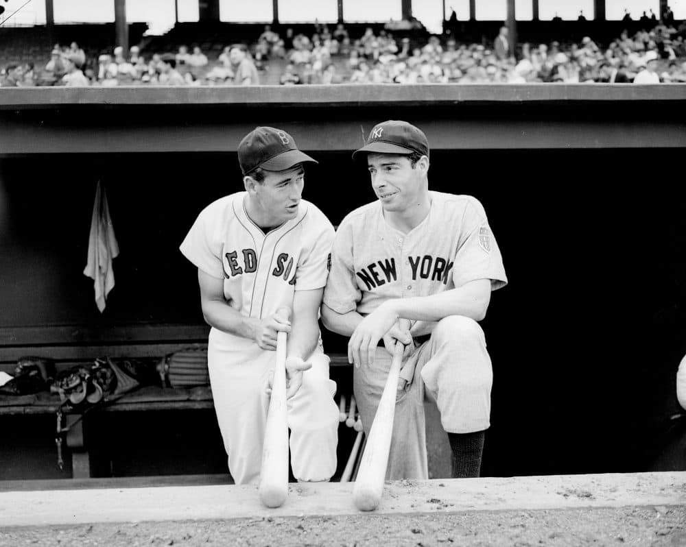 Ted Williams, Boston Red Sox, left, talks over records with Joe DiMaggio, the Yankees' heavy-hitting center fielder, on Aug. 18, 1942. (Abe Fox/AP)