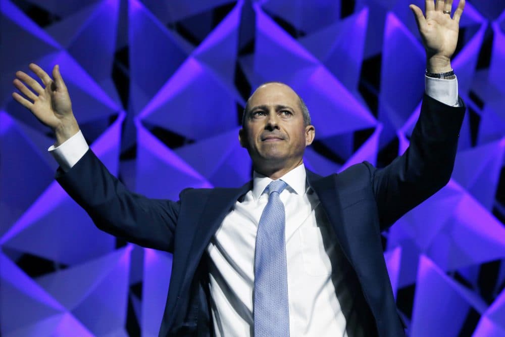 Democratic candidate for governor Jay Gonzalez waves after speaking during the 2018 Massachusetts Democratic Party Convention (Michael Dwyer/AP)
