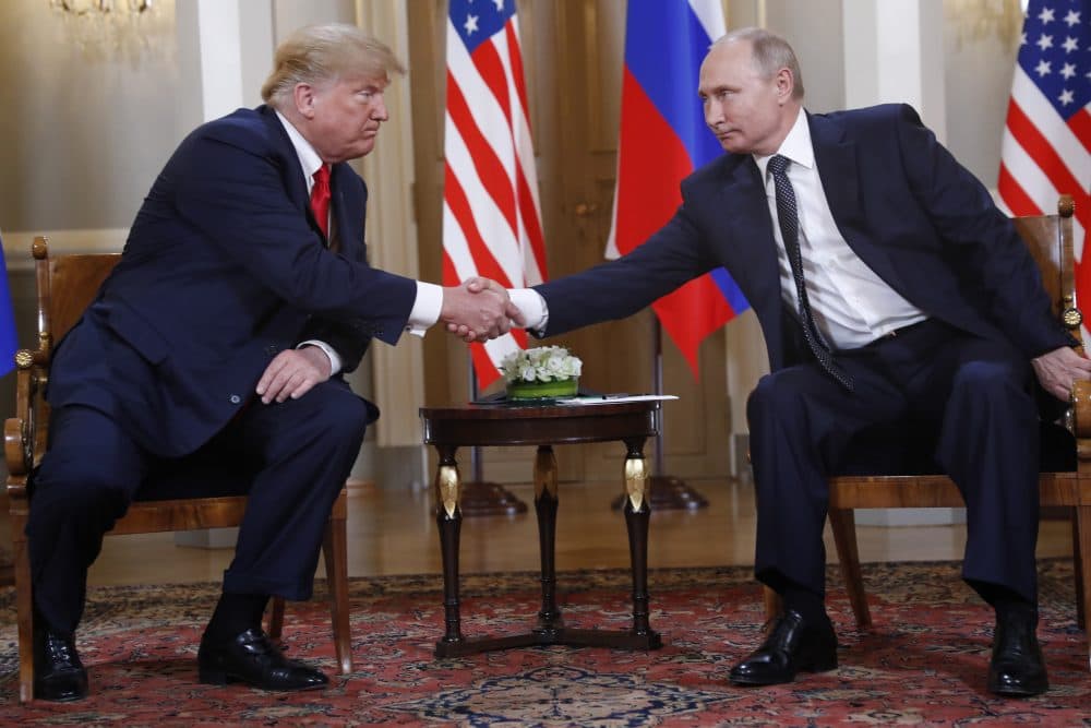 U.S. President Donald Trump, left, and Russian President Vladimir Putin shake hand at the beginning of a meeting at the Presidential Palace in Helsinki, Finland, Monday, July 16, 2018. (Pablo Martinez Monsivais/AP)
