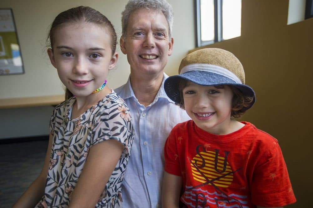 Erik Anderlind, center, and his daughter Cassandra Anderlind and his son Philip. (Jesse Costa/WBUR)