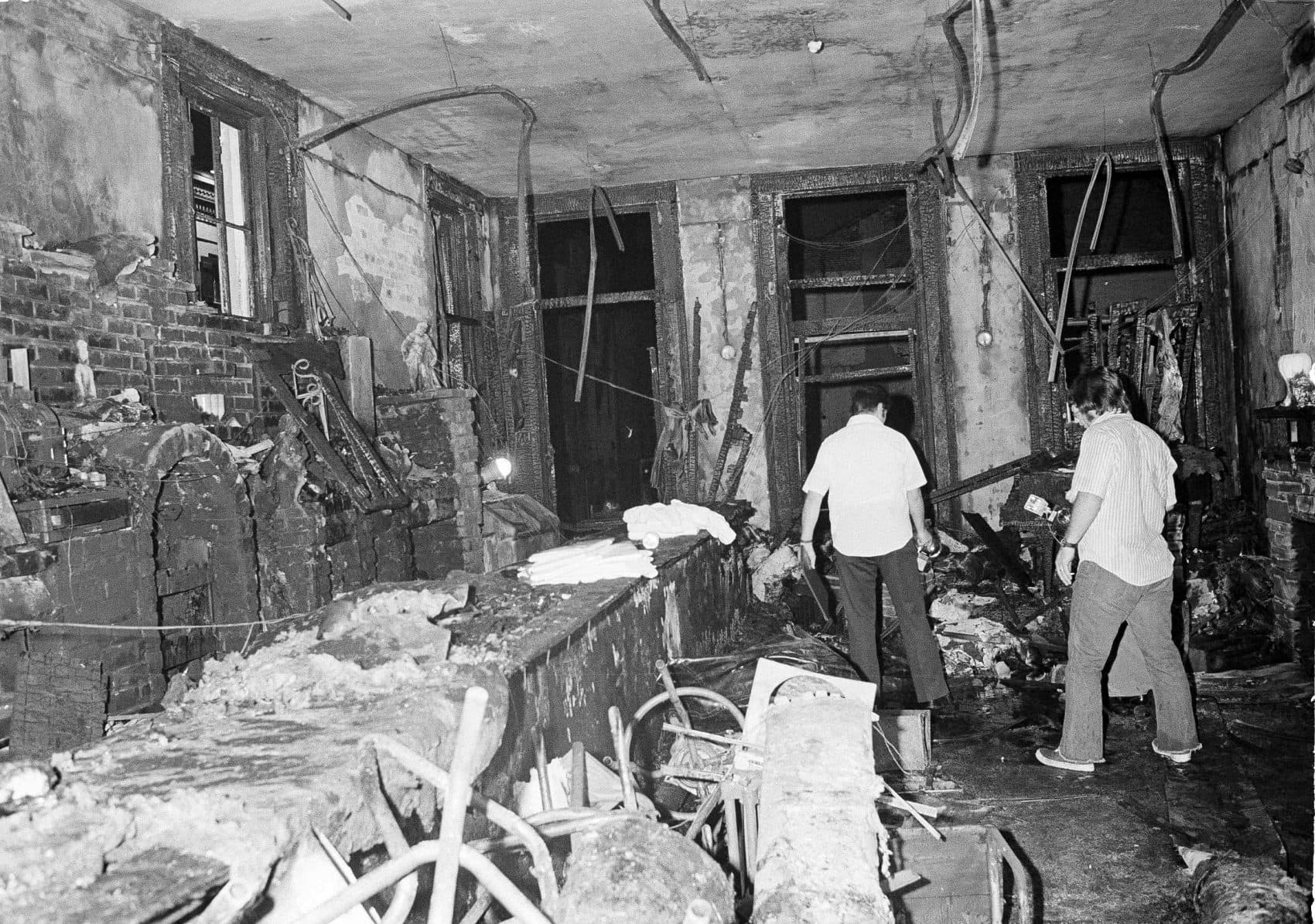 A view inside the UpStairs Lounge following an arson on June 25, 1973. Most of the victims were found near the windows in the background. (Jack Thornell/AP)