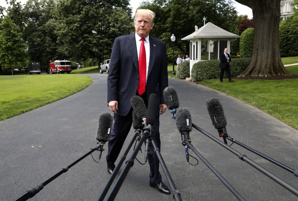 President Donald Trump approaches microphones to speak to the media before boarding the Marine One helicopter on the South Lawn of the White House in Washington, Wednesday, May 23, 2018, en route to a day trip to New York City. (Jacquelyn Martin/AP)