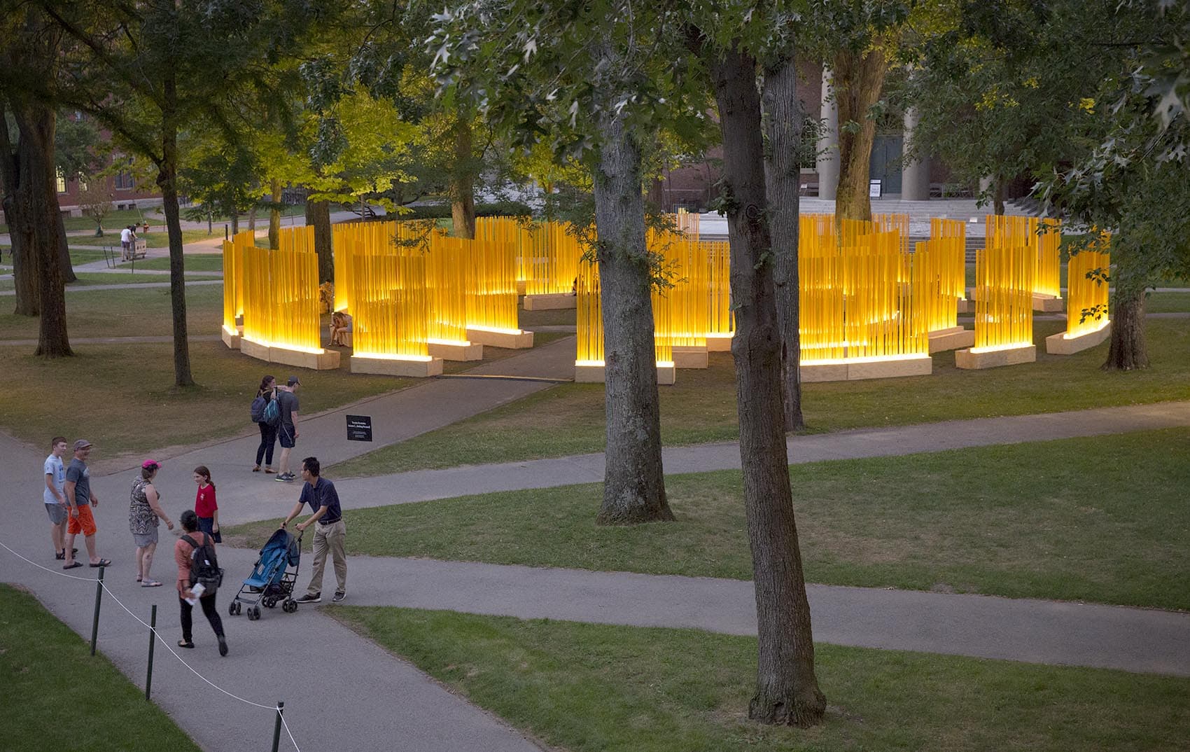 As darkness falls, Teresita Fernández's installation "Autumn (…Nothing Personal)" lights up the center of Harvard Yard. (Robin Lubbock/WBUR)