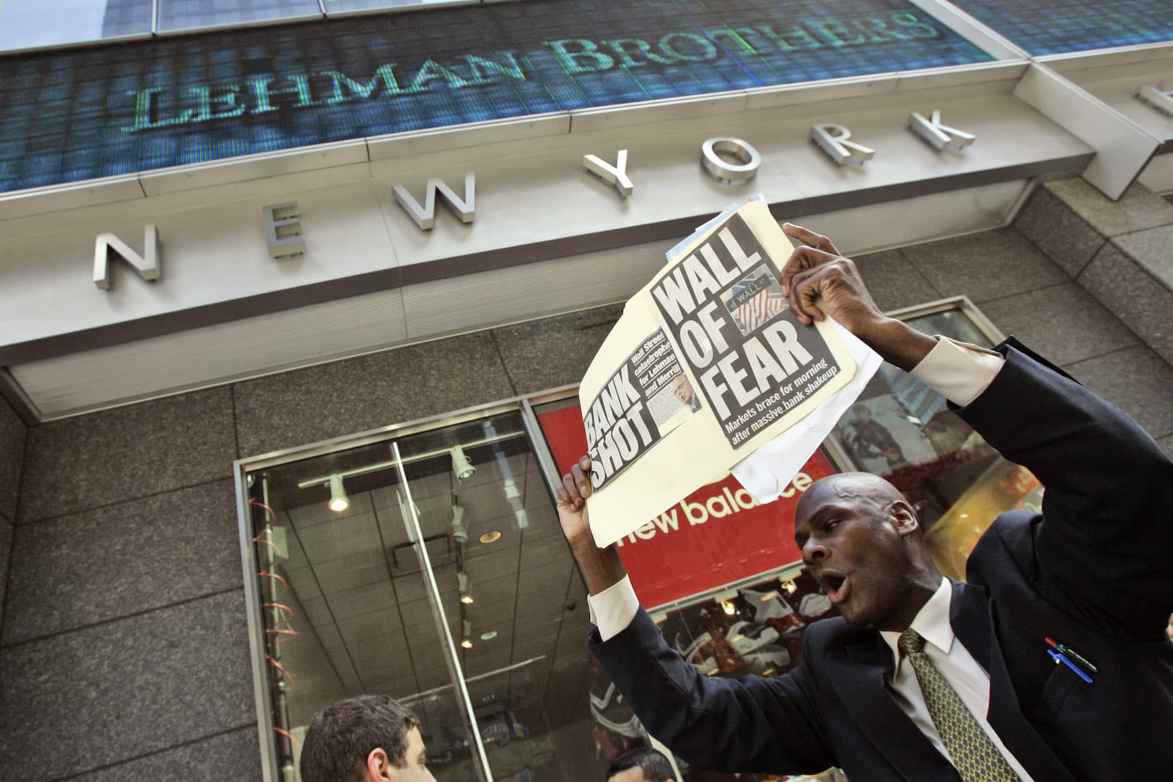 A man demonstrates outside the Lehman Brothers headquarters Monday, Sept. 15, 2008 in New York. When Wall Street woke up Monday morning, two more of its storied firms had fallen. Lehman Brothers, burdened by $60 billion in soured real-estate holdings, filed a Chapter 11 bankruptcy petition in U.S. Bankruptcy Court after attempts to rescue the 158-year-old firm failed.
(Mary Altaffer/AP)