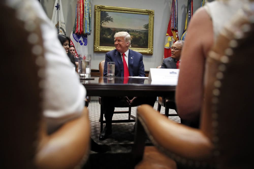President Donald Trump smiles during a discussion for drug-free communities support programs, in the Roosevelt Room of the White House, Wednesday, Aug. 29, 2018, in Washington. (Alex Brandon/AP)