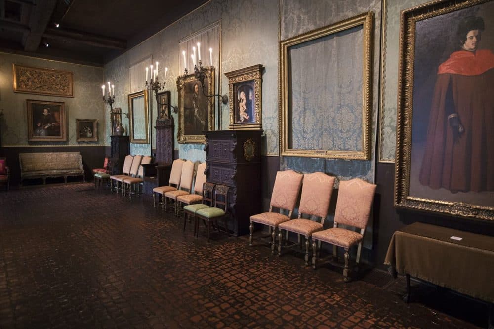 The back wall of the Gardner Museum's Dutch Room where the empty frames of two Rembrandt paintings hang. (Jesse Costa/WBUR)