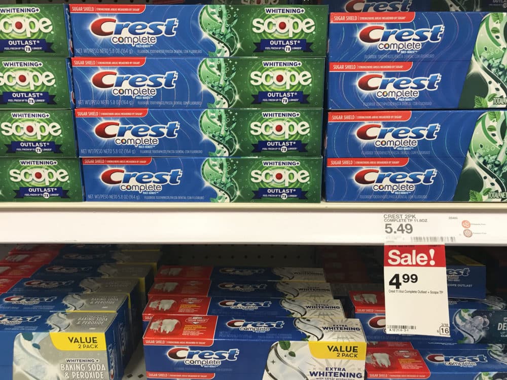 How did you make your mind up about which brand of toothpaste to buy? In this photo, Crest toothpaste fills the shelves of a grocery store in Aventura, Fla. (Brynn Anderson/AP)