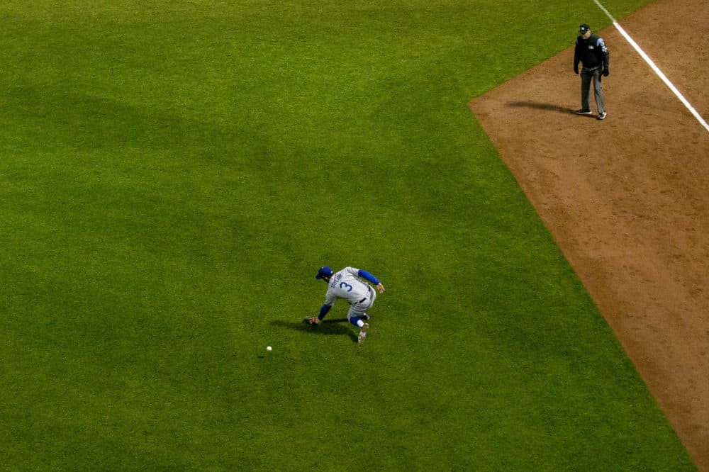 A ball hit by Andrew Benintendi slips past Dodgers left fielder Chris Taylor in the third inning. (Jesse Costa/WBUR)