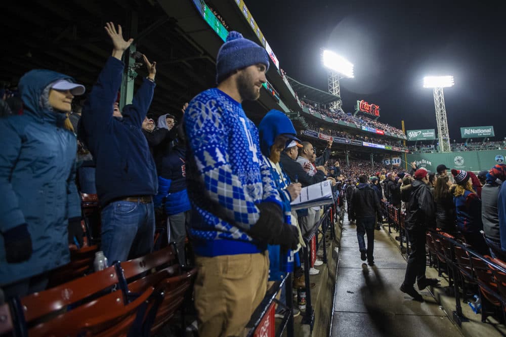 Los Angeles Dodger fans are unhappy after the Red Sox regain the lead, 5-3. (Jesse Costa/WBUR)