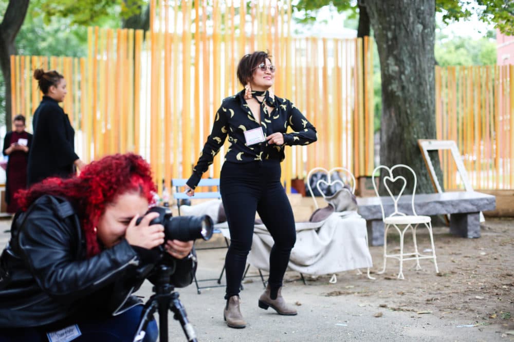 Portrait photographer Liz Slaughter (left) and Diana Oh (right) at “Chosen Family Portrait," Oh's first installation stemming from her residency at A.R.T. (Courtesy A.R.T.)