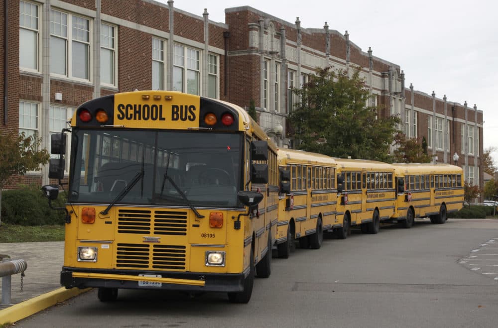 School busses wait to pick up students Wednesday, Nov. 2, 2011, in Tacoma, Wash. (Ted S. Warren/AP)