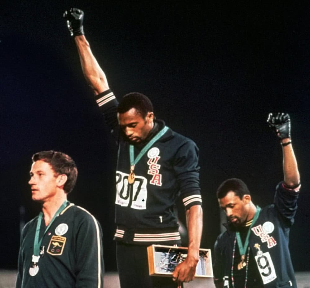 Tommie Smith and John Carlos won gold and bronze, respectively, in the 200-meter run at the 1968 Olympic Games. (AP)