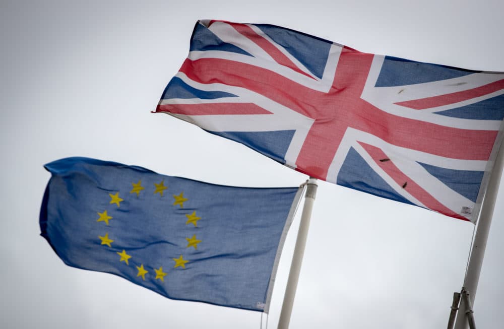 The Union Jack flag flies besides the flag of the European Union in front of City Hall in Cardiff, Wales. (Matt Cardy/Getty Images)