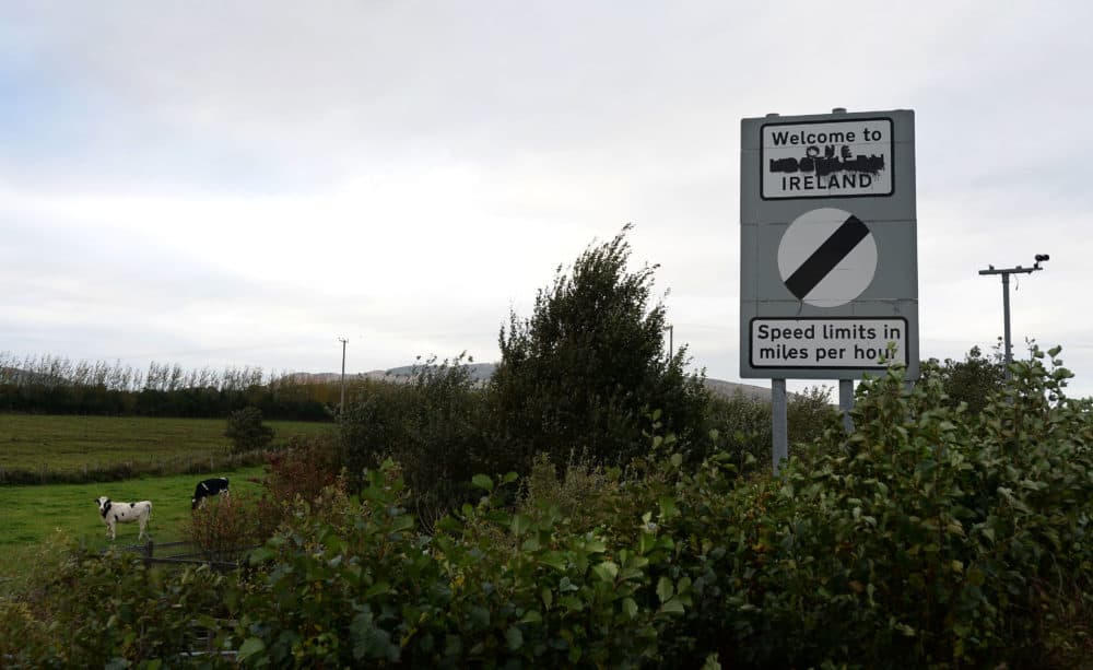 A defaced "Welcome to Northern Ireland" sign, spray-painted to read "Welcome to One Ireland," is situated on the Irish and U.K. border in Newry, Northern Ireland, on Oct. 9, 2018. (Charles McQuillan/Getty Images)
