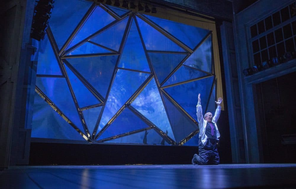 Omar Ebrahim as Schoenberg in the closing scene of "Schoenberg In Hollywood" during a dress rehearsal at the Paramount Theater. (Jesse Costa/WBUR)