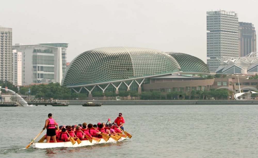 There are now breast cancer survivor dragon boat teams around the world. (Wong Maye-E/AP)