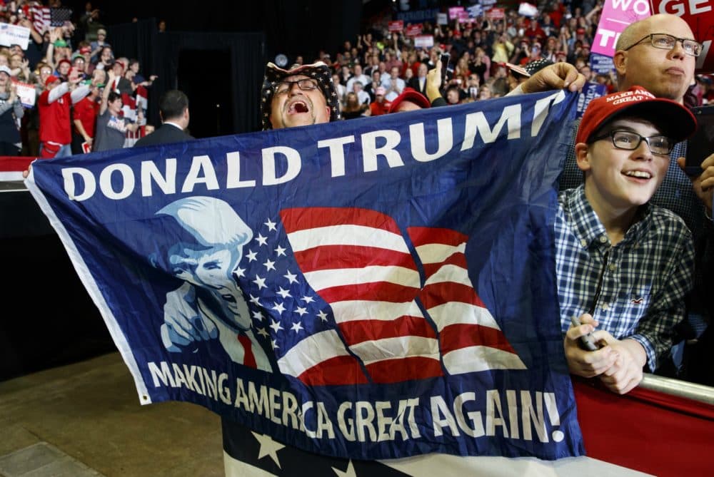 Supporters of President Donald Trump cheer as the president arrives to speak during a rally at Show Me Center, Monday, Nov. 5, 2018, in Cape Girardeau, Mo.. (Carolyn KasterAP)