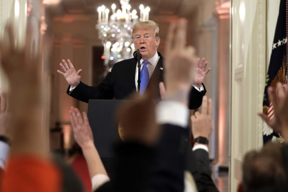 President Donald Trump reacts as reporters raise their hands to ask questions during a news conference in the East Room of the White House, Wednesday, Nov. 7, 2018, in Washington. (AP Photo/Evan Vucci)