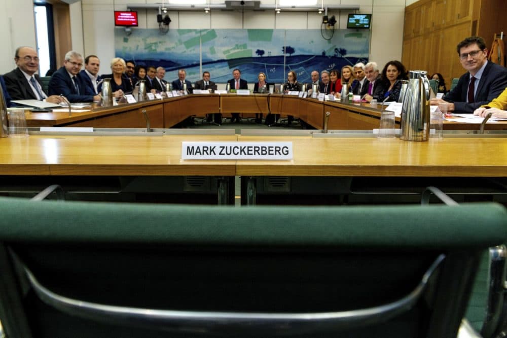The International Grand Committee with representation from 9 Parliaments and Mark Zuckerberg in non-attendance. Lawmakers from nine countries grilled Facebook executive, Richard Allan, on Tuesday as part of an international hearing at Britain's parliament on disinformation and "fake news." Facebook's vice president for policy solutions, answered questions in place of his boss, CEO Mark Zuckerberg, who ignored repeated requests to appear. (Gabriel Sainhas/House of Commons via AP)