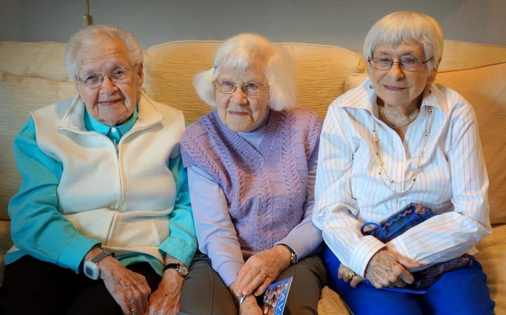Holocaust survivors Edith Bard (left), Trudy Schwartz (middle) and Esther Adler, at the Orchard Cove Independent Living Facility in Canton, Mass. (Courtesy of John Pregulman)
