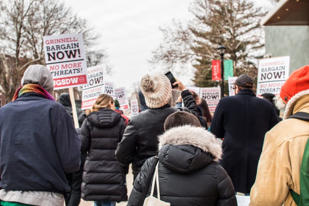 Students at Grinnell College in Iowa hold a protest on Dec. 7 in support of expanding the student-workers union. (Courtesy of Paul Chan Htoo Sang/Union of Grinnell Student Dining Workers)