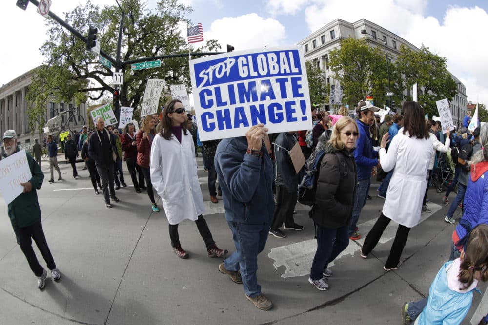 Protesters during a march for science Saturday, April 22, 2017, in Denver. The Mile High City is joining communities around the globe where people are marching to defend scientific work from attacks including U.S. government budget cuts. (David Zalubowski/AP)