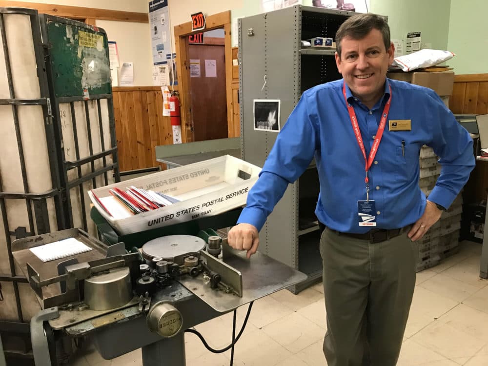 Brian Thompson, postmaster for the bustling post office in the little town of Bethlehem, New Hampshire. (Lisa Mullins/WBUR)