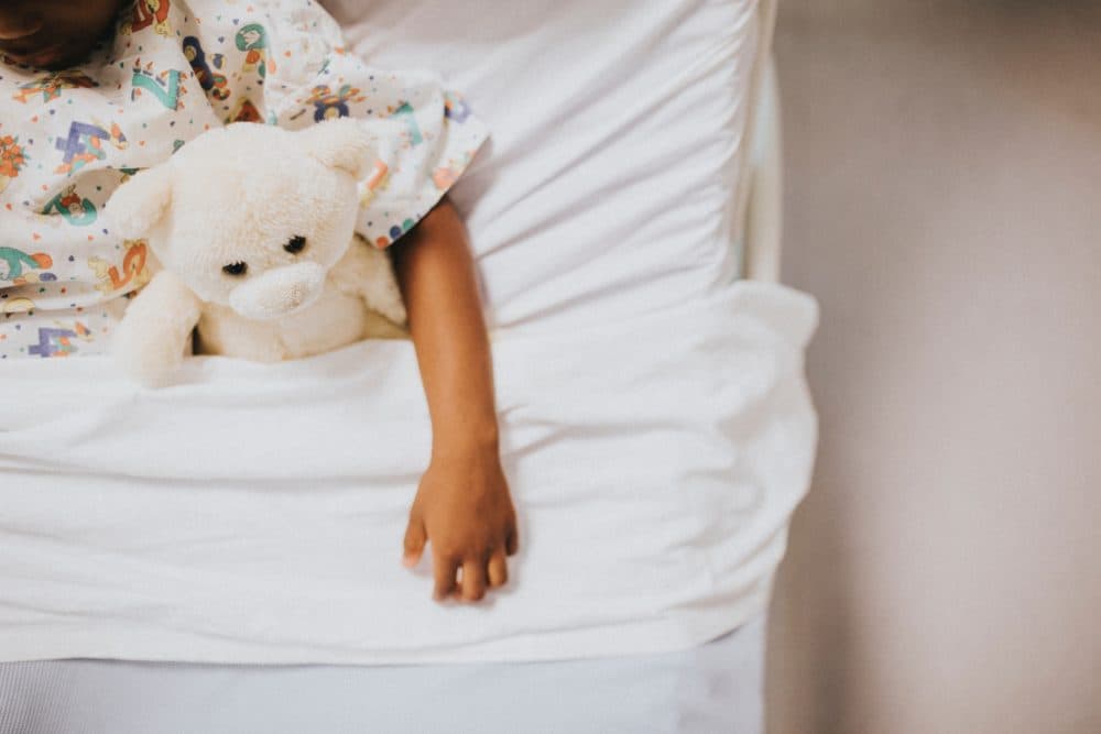 A sick child. (rawpixel/Unsplash)