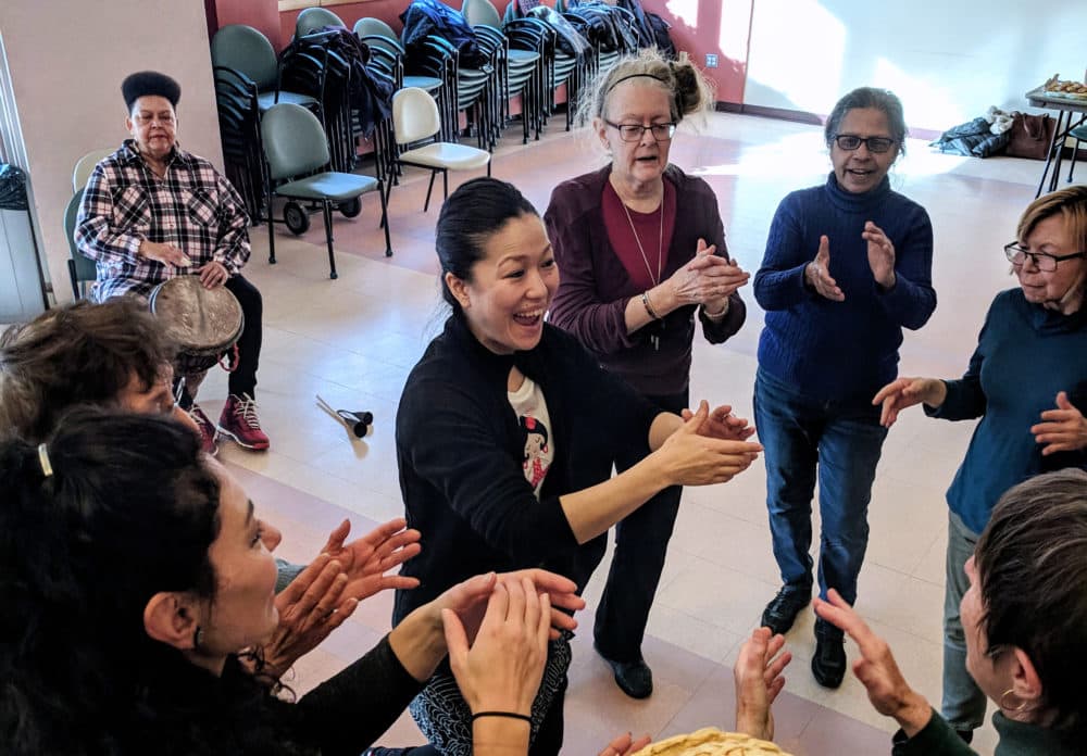 Yosi Karahashi leads her class at the Cambridge Senior Center. (Jessica Ullian for WBUR)