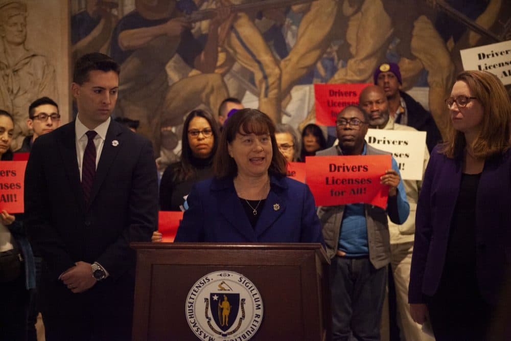 Sen. Brendan Crighton, Rep. Tricia Farley-Bouvier, and Rep. Christine Barber, backed by advocates, unveiled legislation Wednesday that would allow undocumented immigrants to acquire standard Massachusetts driver's licenses. (Chris Lisinski/SHNS)