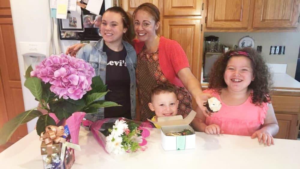 Leslie Reiss, who works for the U.S. Marshals Service as a management and program analyst, with her three children. (Courtesy of Leslie Reiss)