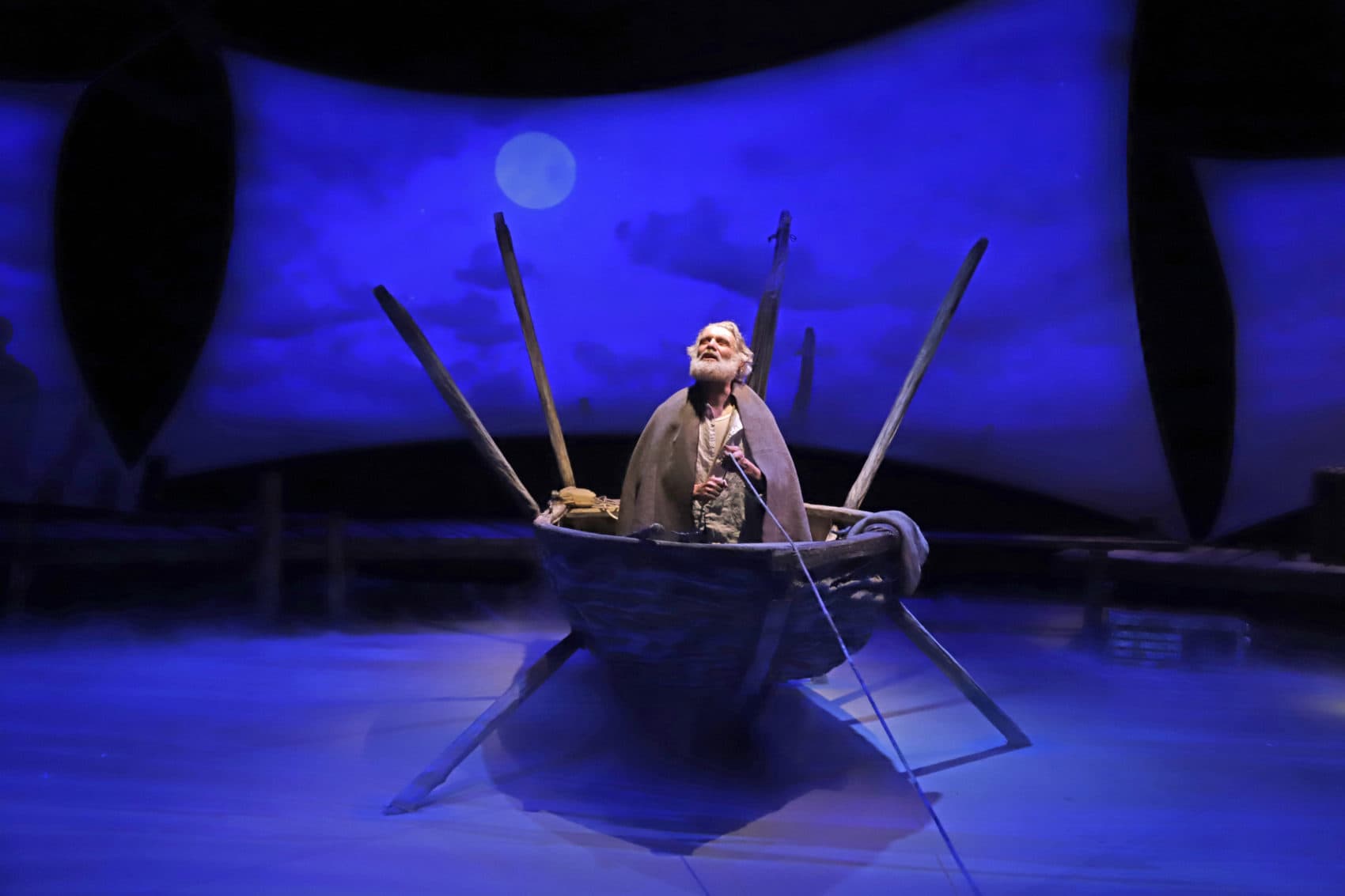 Actor Anthony Crivello plays the roll of Santiago in a stage adaptation of Ernest Hemingway's "Old Man and the Sea" during a dress rehearsal at the Pittsburgh Playhouse in Pittsburgh Sunday, Jan. 27, 2019. The stage version was written by journalist and playwright AE Hotchner, the writer's confidant and fishing companion in Cuba during the period in which the novella was written, and his son Tim Hotchner. (Gene J. Puskar/AP)