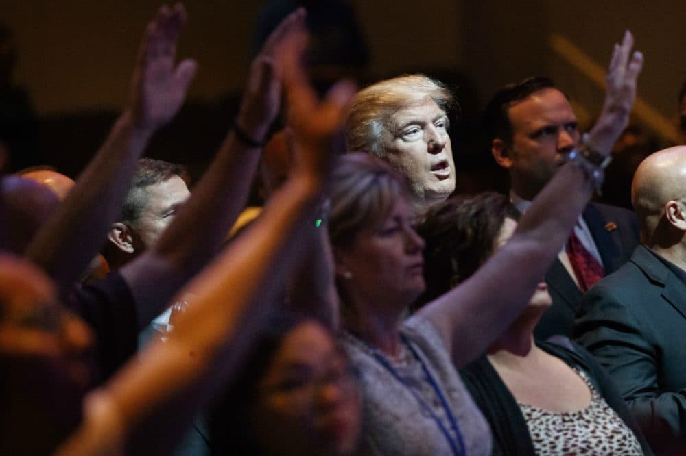 Donald Trump stands during a service at the International Church of Las Vegas, Sunday, Oct. 30, 2016, in Las Vegas. (Evan Vucci/AP)