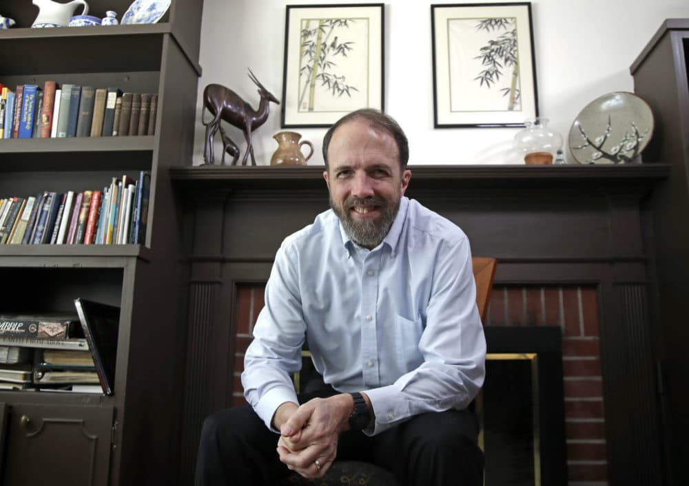 In this Jan. 30, 2019 photo, Dr. Rick Sacra poses at his home in Holden, Mass. Sacra, a Massachusetts missionary doctor who was among a handful of Americans treated and cured of Ebola in 2014, is being honored for his work in Liberia through the deadly epidemic. (Elise Amendola/AP)