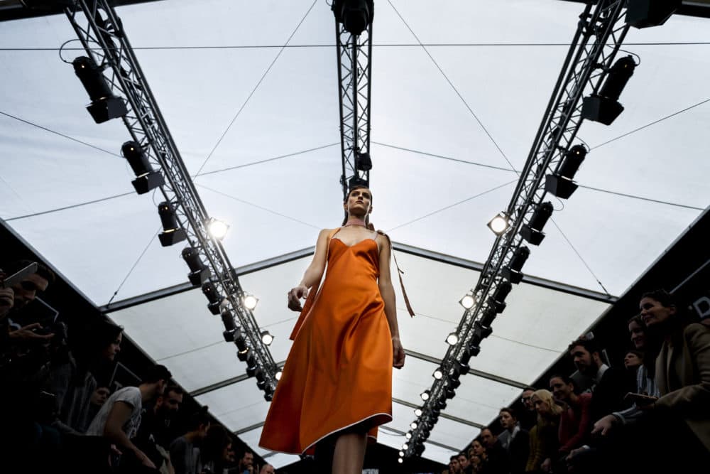A model presents a Spring-Summer 2016 creation by Moises Nieto for Ecoembes, at the Madrid Fashion Show, in Madrid, Spain, Monday, Feb. 8, 2016. At least 80 percent of the fabrics in this fashion show are made from recycled materials. (Daniel Ochoa de Olza/AP)