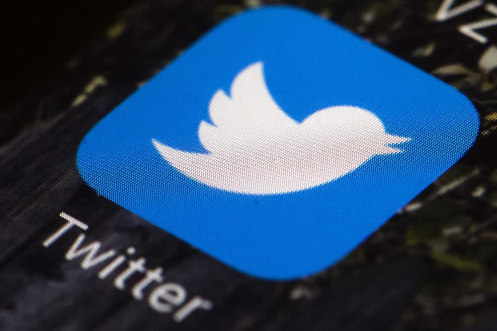 The Twitter app icon on a mobile phone in Philadelphia. (Matt Rourke/AP)