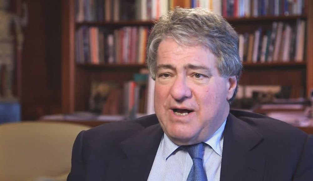 Leon Black, founder and CEO of Apollo, discusses the roots of his company in a press video. (Screenshot via Apollo video)