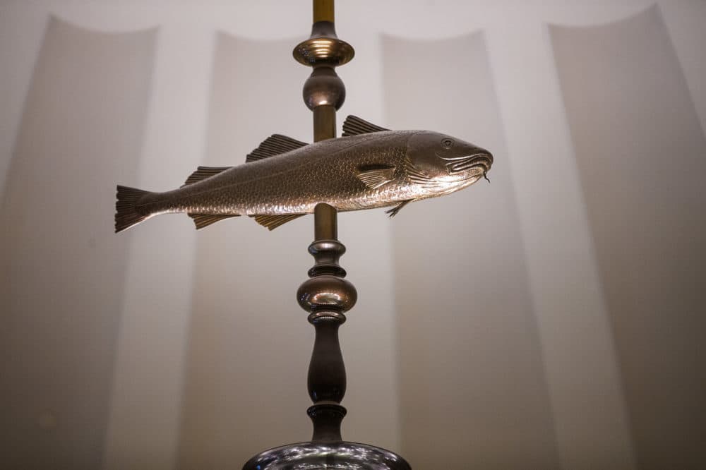 The “Holy Mackerel" sits atop the chandelier and was in good shape ahead of the renovations. It only needed some cleaning. (Jesse Costa/WBUR)