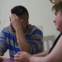 Jose Martin Paz Flores speaks to WBUR in 2017 about the events leading up to his arrest by federal immigration agents with his wife Rosa Benitez. (Jesse Costa/WBUR)