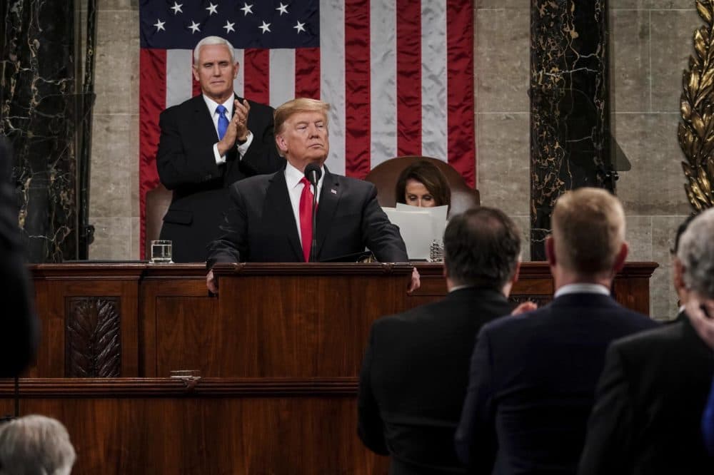 President Donald Trump gives his State of the Union address to a joint session of Congress, Tuesday, Feb. 5, 2019 at the Capitol in Washington, as Vice President Mike Pence, left, and House Speaker Nancy Pelosi look on. (Doug Mills/The New York Times via AP, Pool)