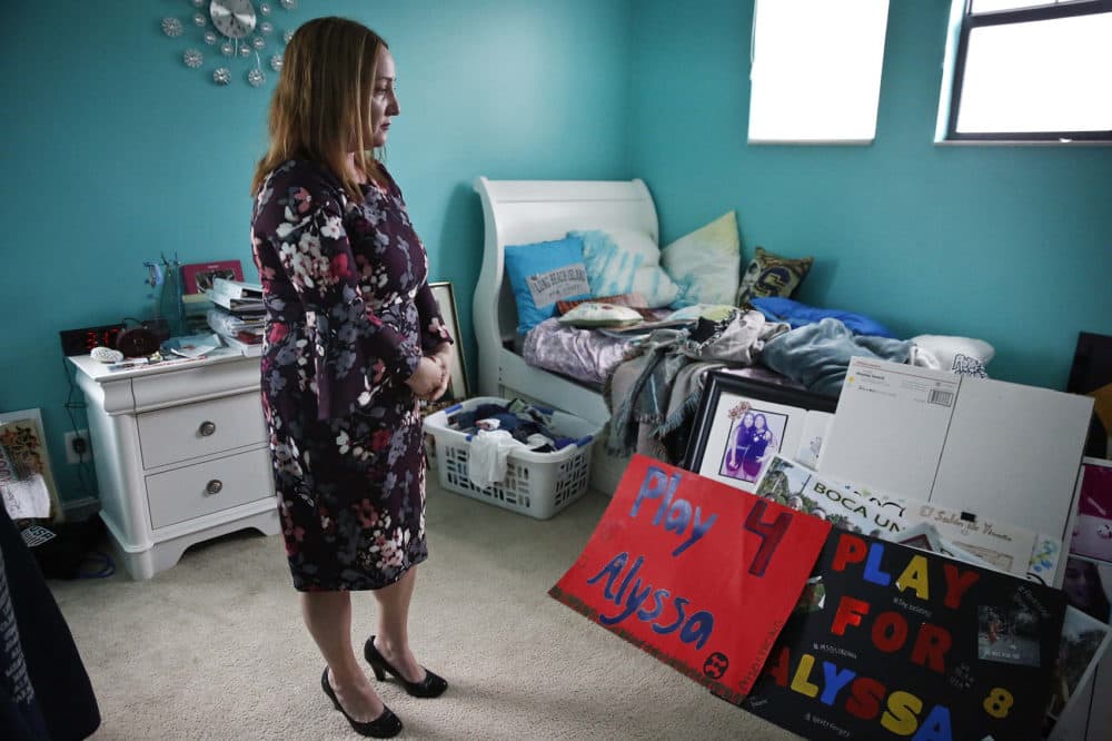 Lori Alhadeff, mother of 14-year-old Alyssa Alhadeff who was one of 17 people killed at Marjory Stoneman Douglas High School, stands in her daughter's bedroom on Wednesday, Jan. 30, 2019, in Parkland, Fla. Much of the teenager's turquoise-colored bedroom remains untouched. (Brynn Anderson/AP)
