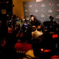 Tom Brady speaks to the media before Super Bowl LIII. (Kevin C. Cox/Getty Images)