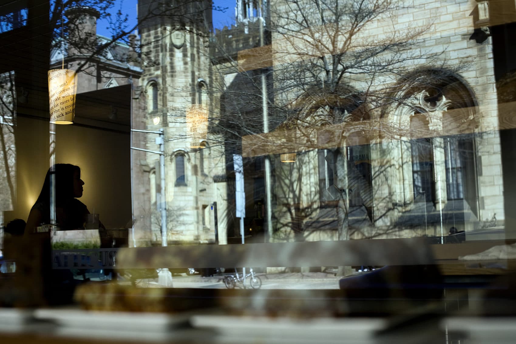 Patrons sit in the Atticus Bookstore Cafe, which overlooks the Yale University campus, on Chapel Street in New Haven, Conn. (Christopher Capozziello/Getty Images)