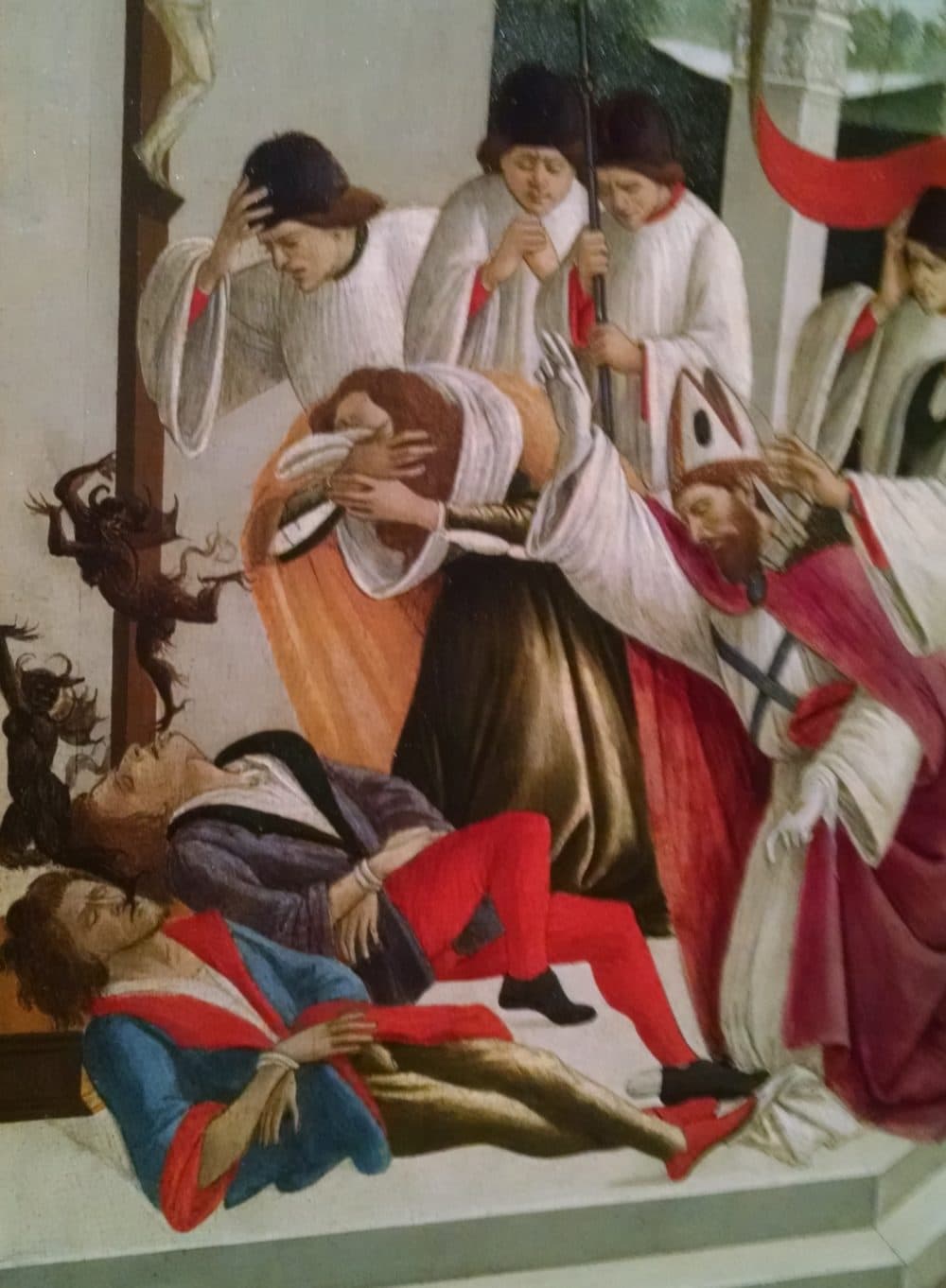 Zenobius exorcising devils in Botticelli's "Three Miracles of Saint Zenobius," on loan from the National Gallery in London. (Lloyd Schwartz for WBUR)